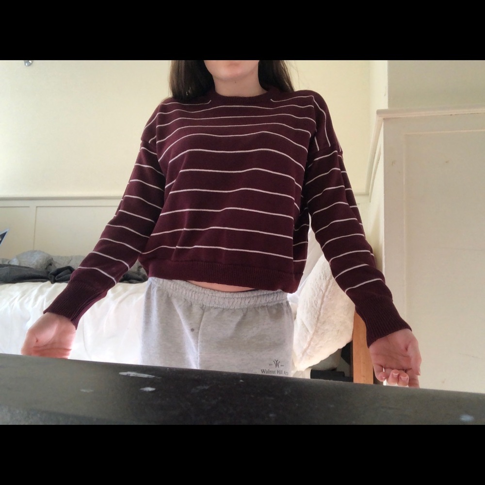 Red long sleeve with white stripes.